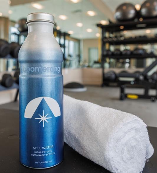 A Hotel Polaris branded water bottle in the fitness center