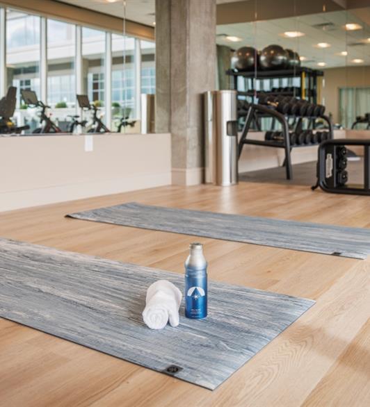 A Hotel Polaris branded water bottle in the fitness center