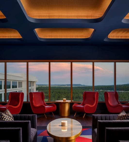 Chairs at the Aviator with windows behind it