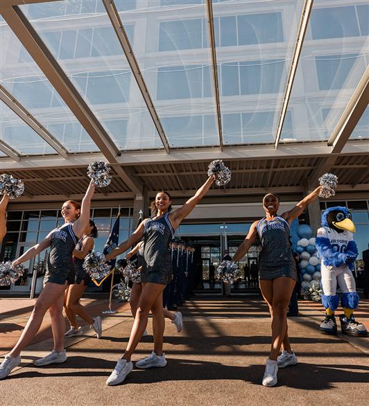 Cheerleaders in front of Hotel Polaris