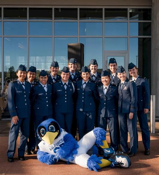 Cadets posing for a photo with the Air Force mascot