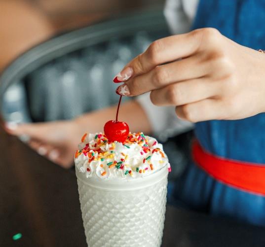 Someone with an ice cream shake