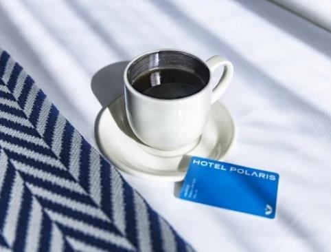 A coffee and a room key