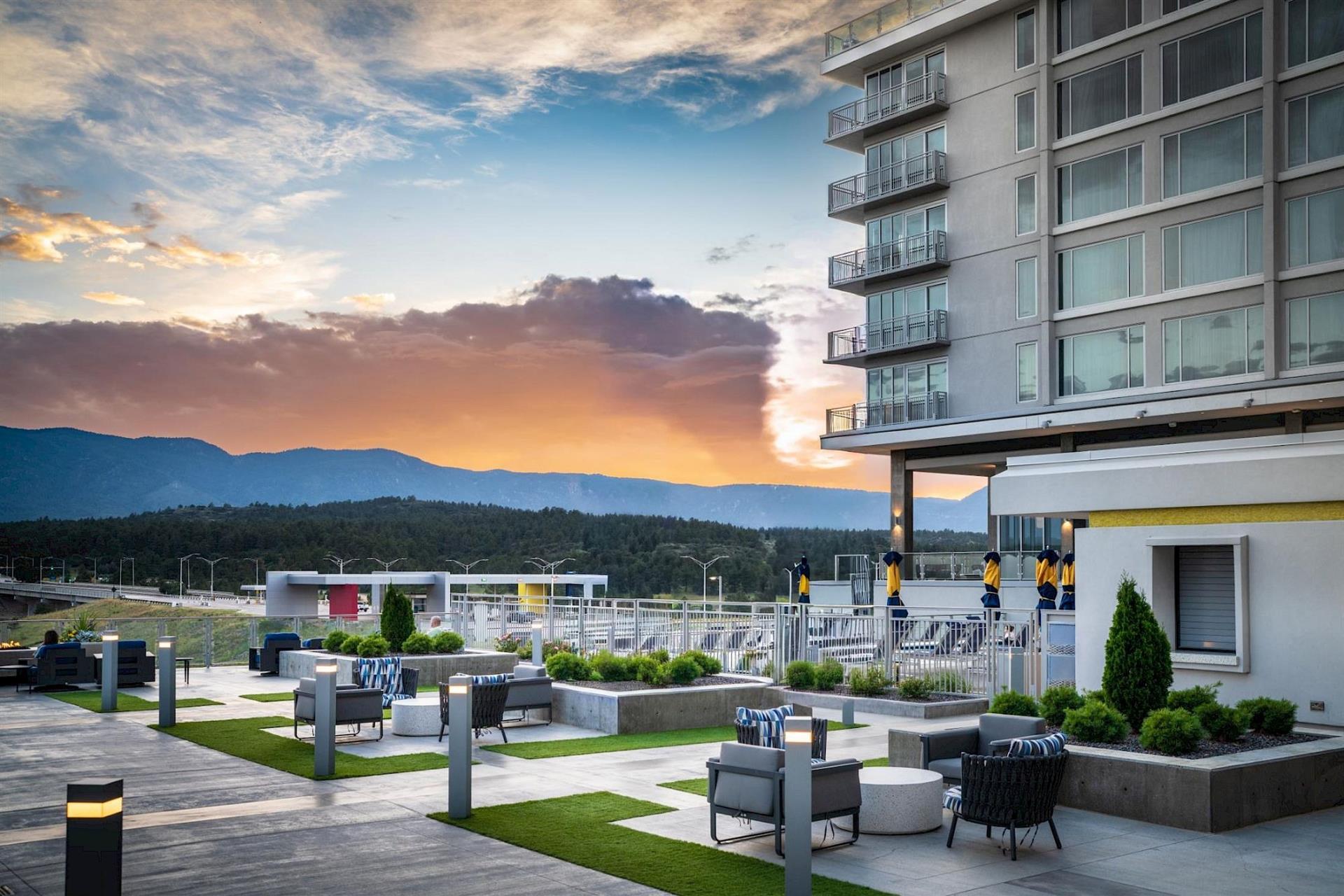 A view of the hotel and a sunset