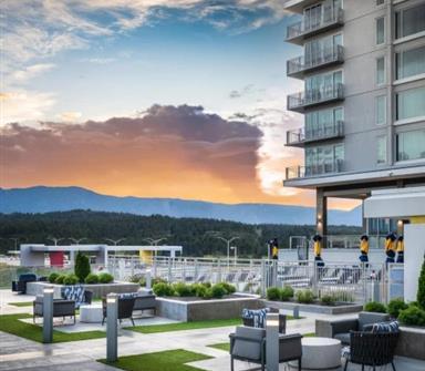 A view of the hotel and a sunset